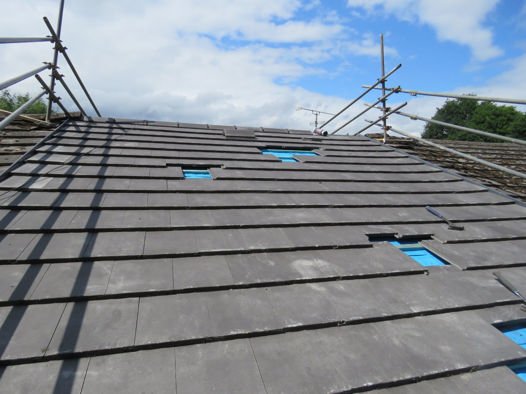 Natural slate roof repair in Charlestown