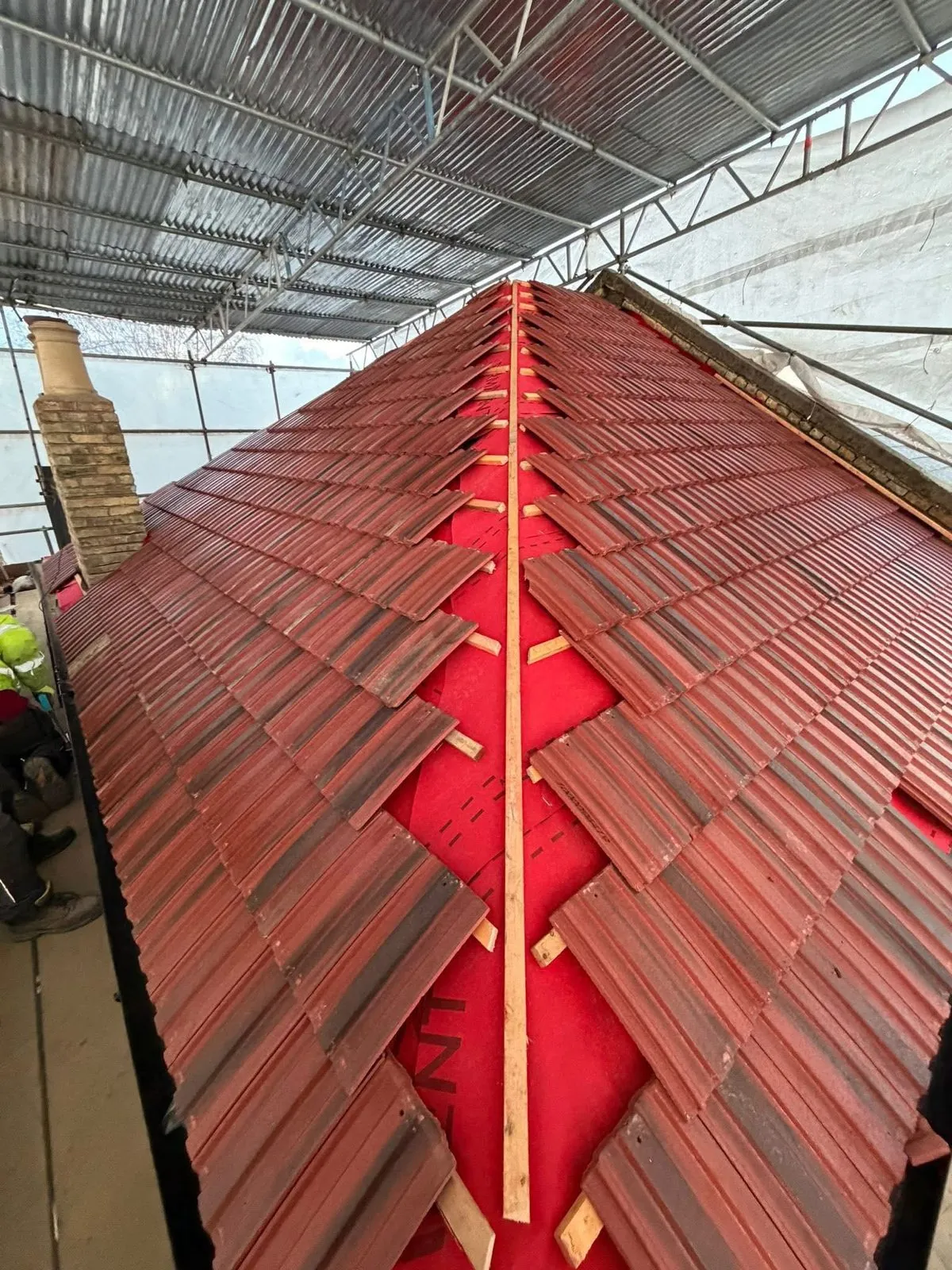 Complete roof replacement with new clay tiles in Charlestown