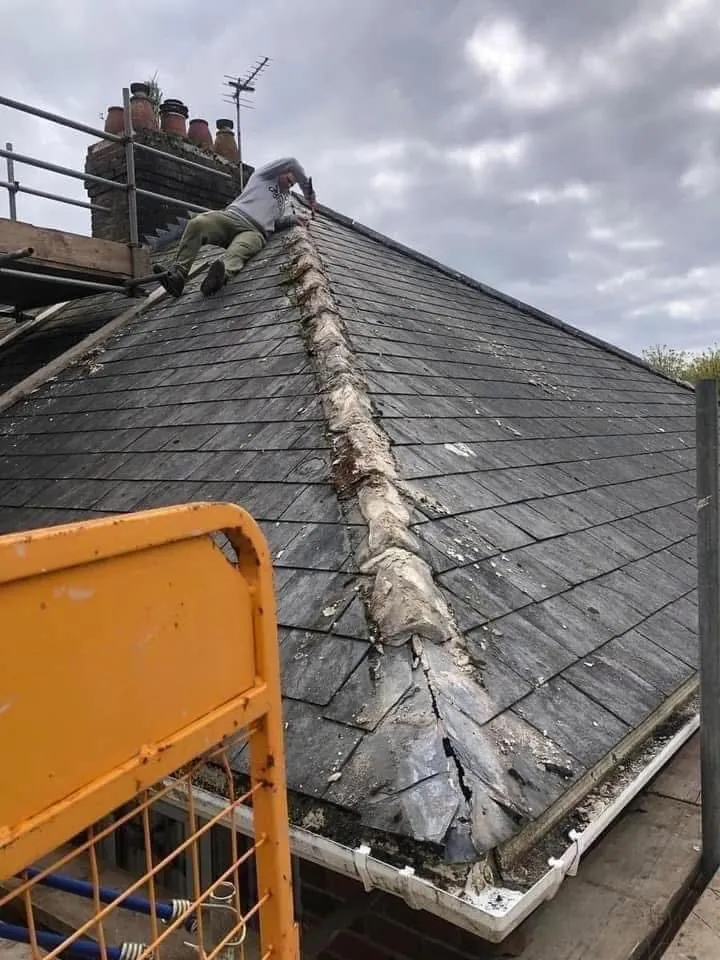 Slate roof ridge and chimney repair in Charlestown